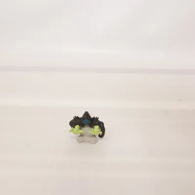 Toy figurine (Black, Green, Gray) from Gormiti