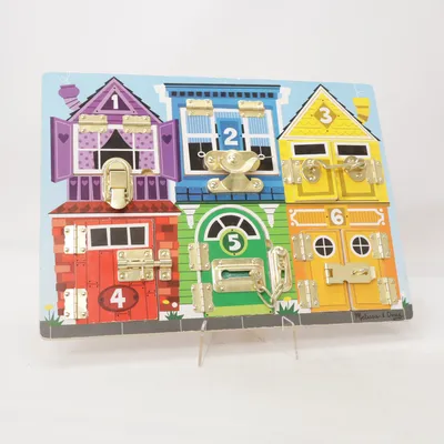 Activity toy (Latches Board) from Melissa & Doug