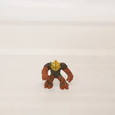 Legetøjsfigur (Brun, Grøn, Gul) fra Giochi Preziosi