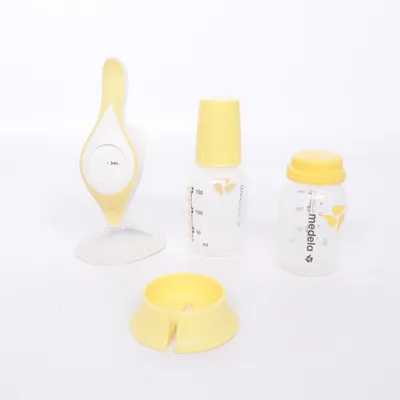 Bröstpump (Vit, Gul, Transparent) från Medela