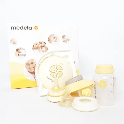 Bröstpump (Vit, Gul) från Medela