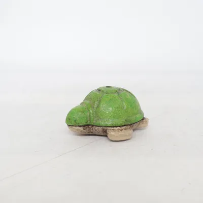 Toy animal (Green, Beige) from PlanToys