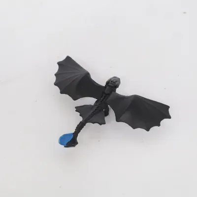 Toy animal (Toothless) from DWA LLC