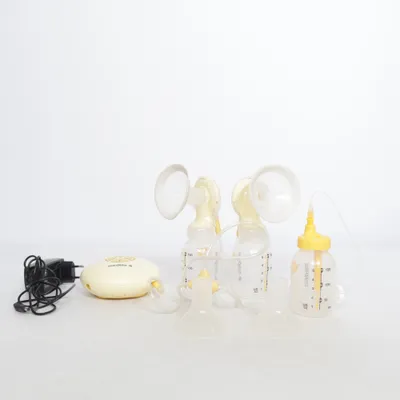 Breast pump (Yellow, White) from Medela