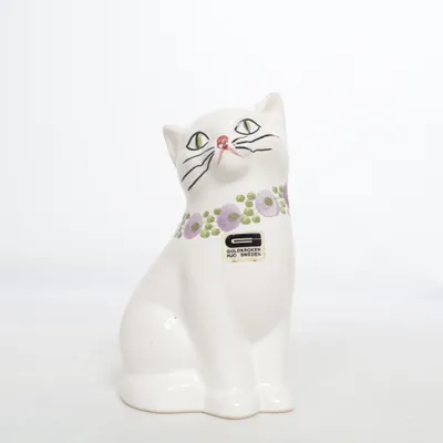 Figurine en porcelaine (Fin kattfigurin fr svenska Guldkroken) de Guldkroken