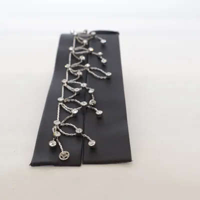 Kroppssmycke (Silverfärgad) Okänd metall