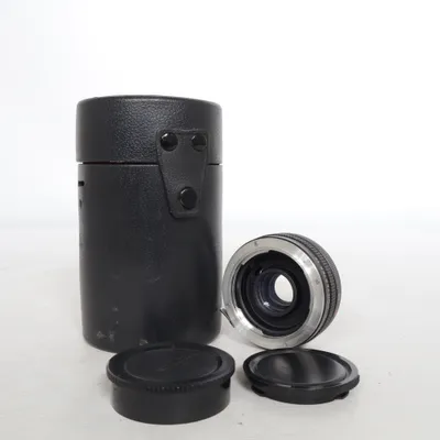 Kameraobjektiv (Svart) från Konica