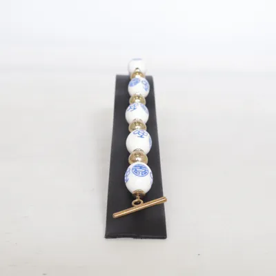 Bracelet (White, Blue, Gold) Unknown metal