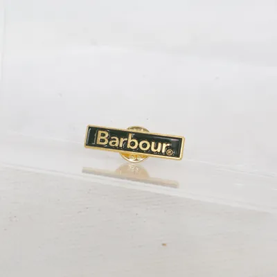 Pin (Guldfärgad, Svart) från Barbour Okänd metall
