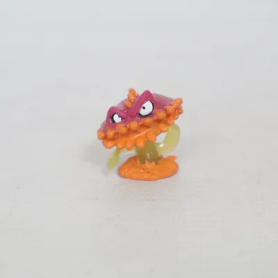 Toy figurine (Red, Orange, Green) from Moose