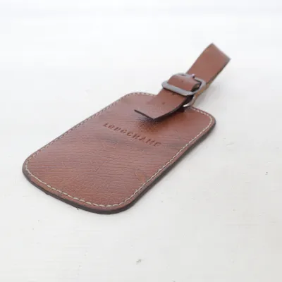 Bagagetag (Brun) från Longchamp Skinn