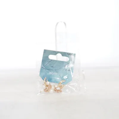 Örhängen (Guldfärgad, Vit) från La Mer Okänd metall