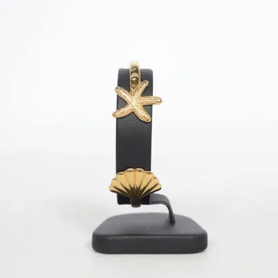 Armband (Muschel und Seestern) från Mahina Club - Purelei Rostfritt stål, Guldpläterad