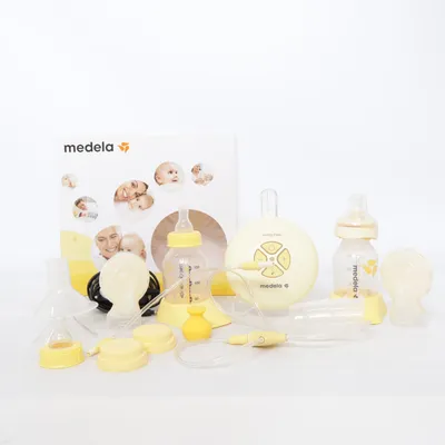 Bröstpump (Vit, Gul) från Medela