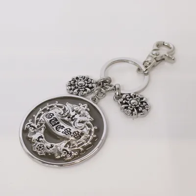 Bag accessories (Silver, Black) from Guess