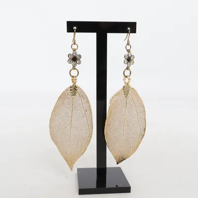 Boucles d'oreilles (Or) de H.D Métal inconnu, Plaqué or