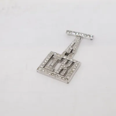 Brosch (Silverfärgad) Okänd metall