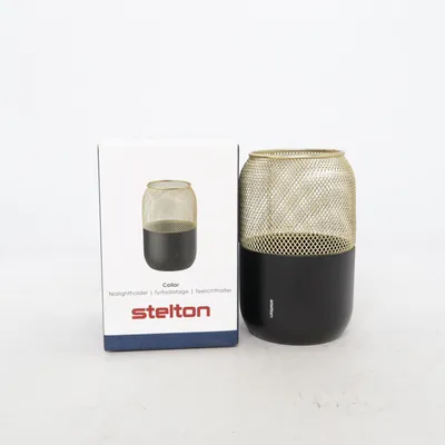 Ljuslykta (Svart, Guldfärgad) från Stelton