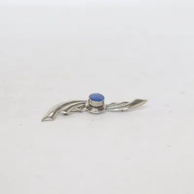 Brosch (Silverfärgad, Blå) Okänd metall