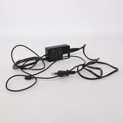 Computer oplader van Nom