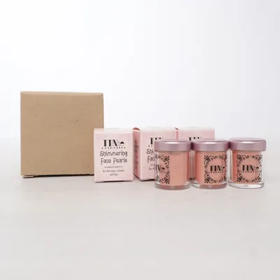 Highlighter (Shimmering Face Pearls) van Tinte Cosmetics
