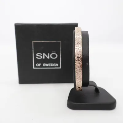 Armring (Guldfärgad) från Snö of Sweden Okänd metall