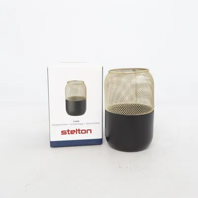 Ljuslykta (Svart, Guldfärgad) från Stelton