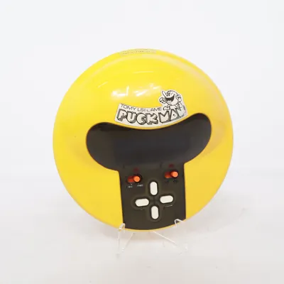 Electronic game (Puck Man) from Tomy