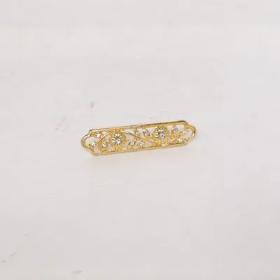 Brosch (Guldfärgad) Okänd metall