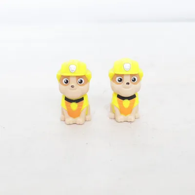 Toy figurine (Yellow, Orange, Brown) from Spin Master Ltd