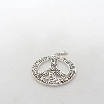 Charm (Silver) Unknown metal