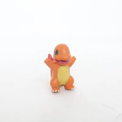 Leksaksfigur (Orange, Gul, Röd) från Pokémon by Tomy