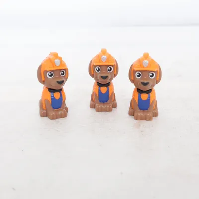 Toy figurine (Orange, Blue, Brown) from Spin Master Ltd