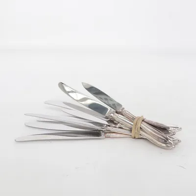 Kniv ( 6 matknivar 1 skalkniv äldre i nysilver)