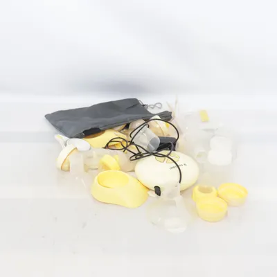 Bröstpump (Gul, Transparent) från Medela