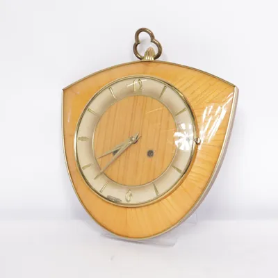 Wandklok (Bruin) van C & M