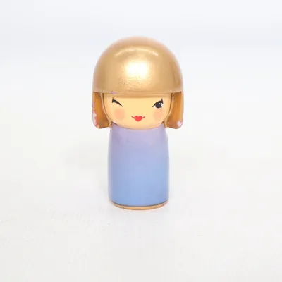 Kokeshi (Blå, Guld) fra Skincity