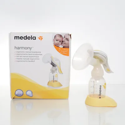 Bröstpump (Vit, Gul) från Medela