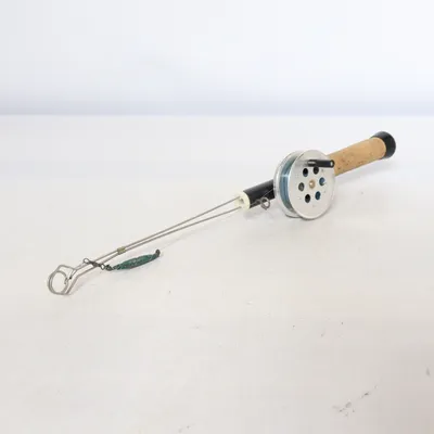 Fishing rod (Abu Garcia, Pimpel 1, pimpelspö, isfiskespö, fiskespö, svart, brun, silverfärgad, trähandtag, rulle, isfiske, vinterfiske, sportfiske, retro, vintage, svensk design, samlarobjekt) from Abu Garcia