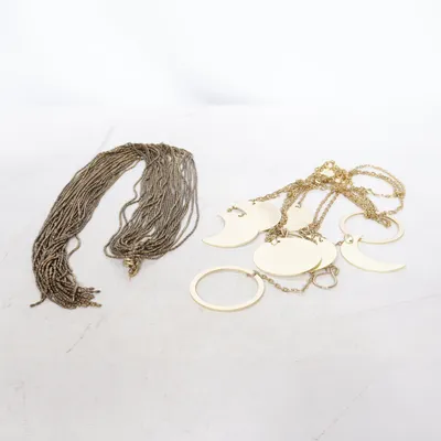 Kroppssmycke (Brun) Okänd metall