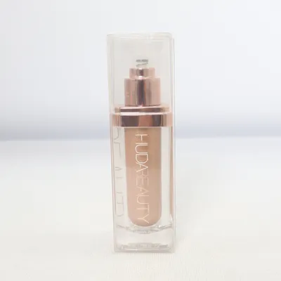 Highlighter (Масло для тела) from Huda Beauty