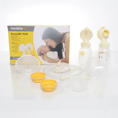 Bröstpump (Vit, Gul) från Medela