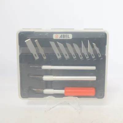 Outil artistique (Argent, Rouge, Noir) de Abel