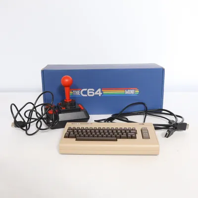 Spelkonsol (Beige, Svart, Röd) från Commodore