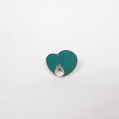 Pin (Grön, Silverfärgad) från Unicef Okänd metall