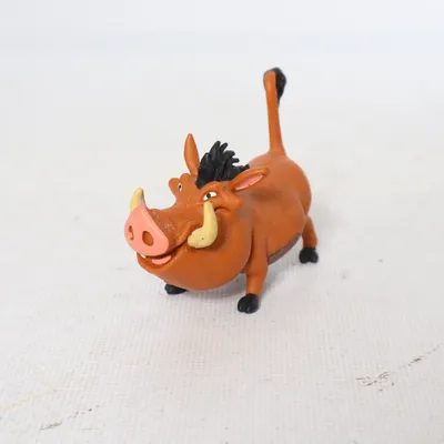 Toy figurine (Pumbaa) from Disney