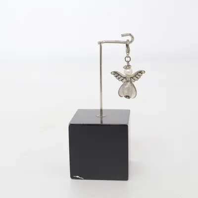 Charme (Argent, Blanc) Métal inconnu