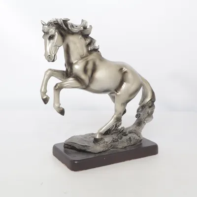 Figurin (Silverfärgad) från Erikshjälpen