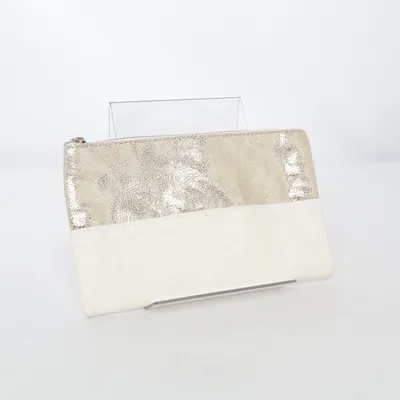 Trousse à maquillage (Or, Blanc) de Clarins