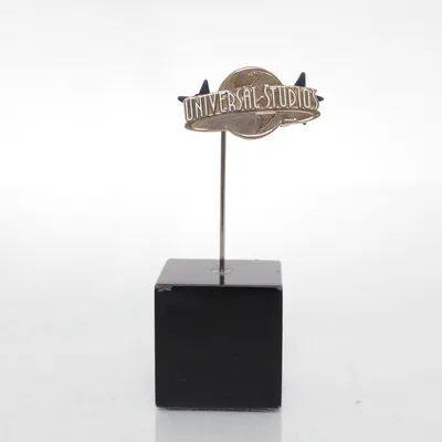 Pin (Guldfärgad) från Universal Studios Okänd metall